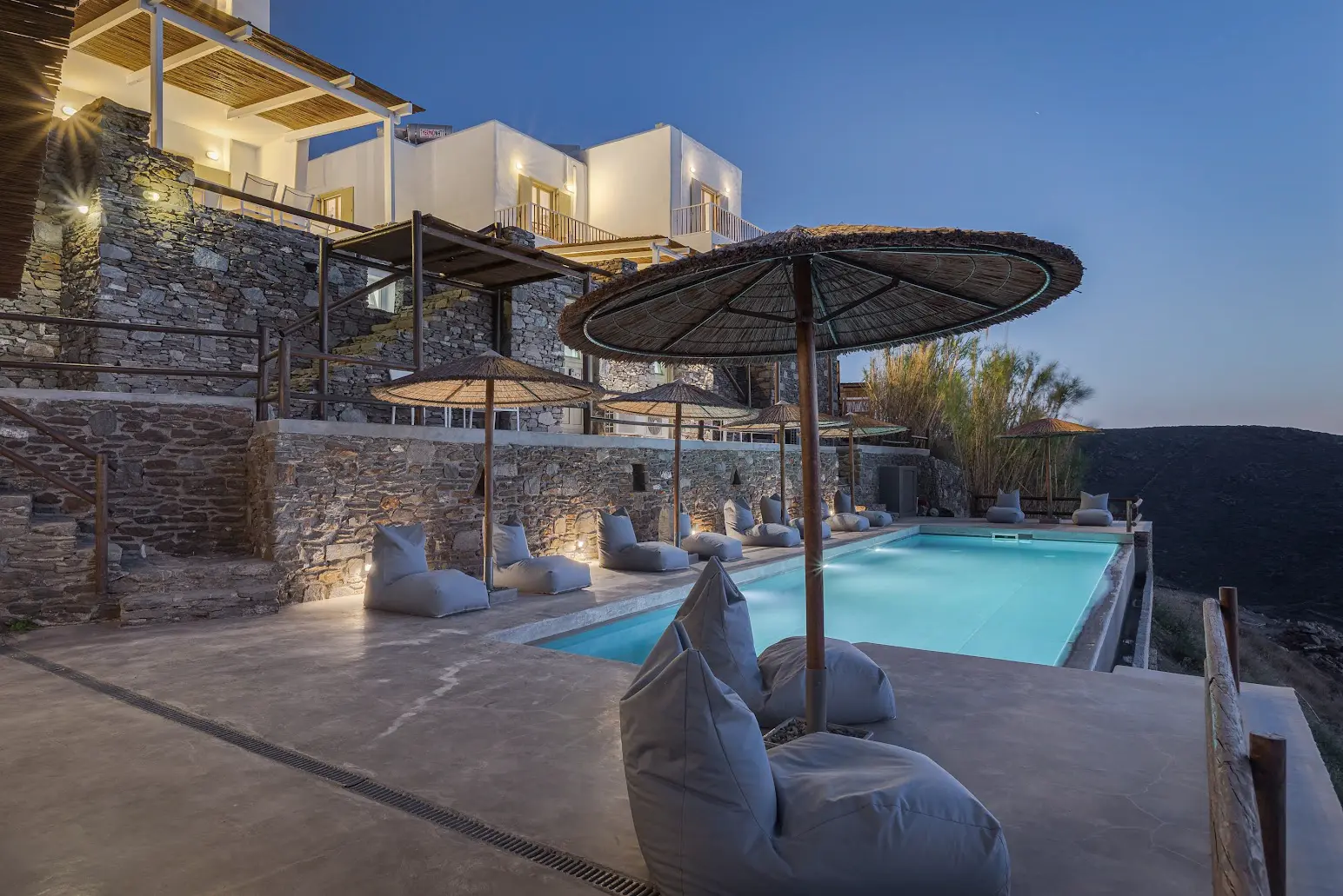 The shared infinity pool at night, Off The Beaten Path
